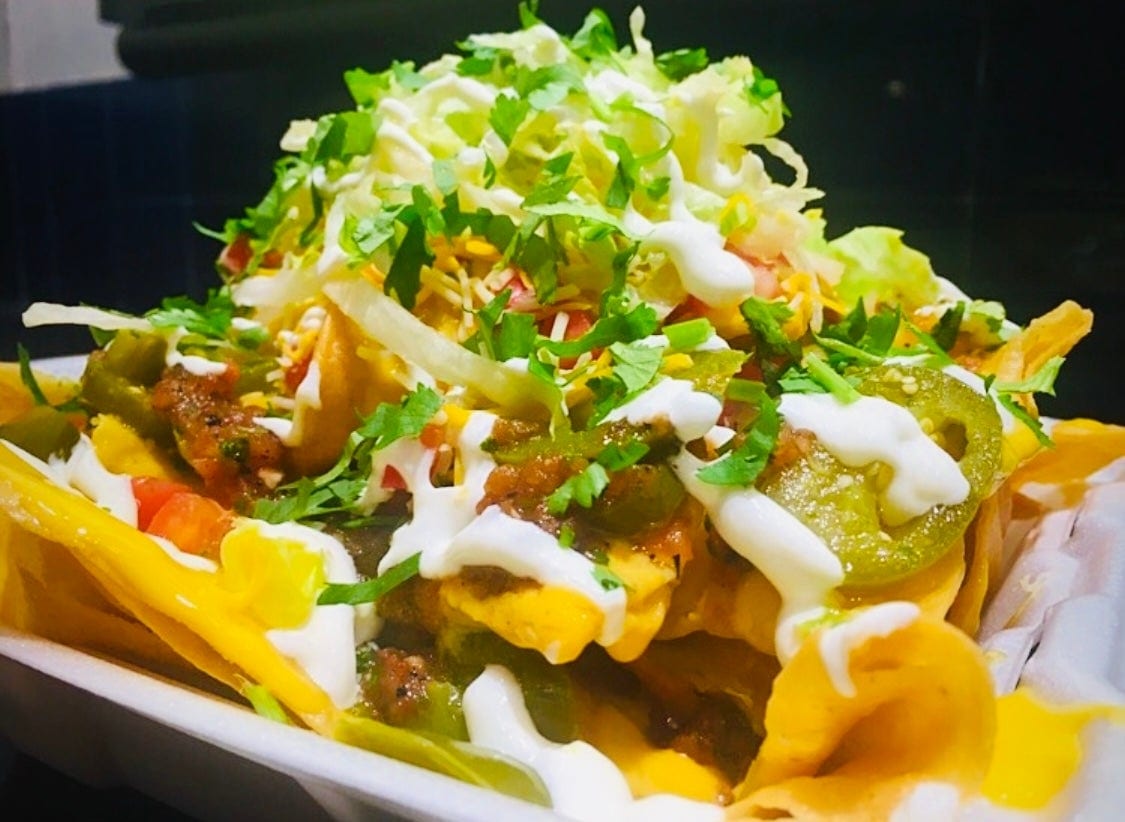 Suadero (Shredded Beef) Nachos Grande.